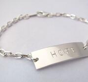 Armband med BUDSKAP